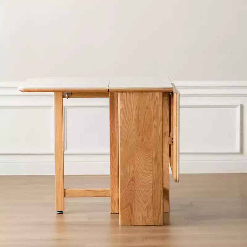 Moderní skládací stůl GDFStudio Agatha z masivního dřeva pro 4-6 osob s deskou z kamenné desky