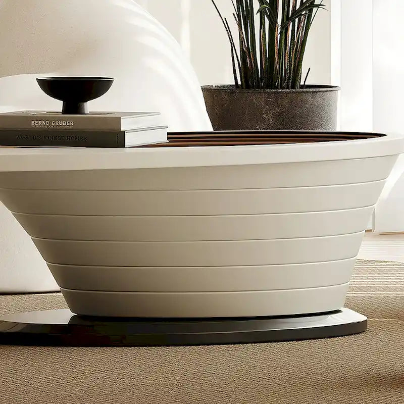Moderner minimalistischer Couchtisch mit ovaler Glasplatte und hellgrauem Untergestell - L 51.18'W 25.59'H 14.37'