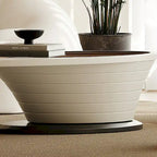 Moderner minimalistischer Couchtisch mit ovaler Glasplatte und hellgrauem Untergestell - L 51.18'W 25.59'H 14.37'