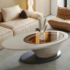 Moderner minimalistischer Couchtisch mit ovaler Glasplatte und hellgrauem Untergestell - L 51.18'W 25.59'H 14.37'